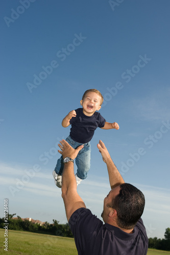 Adorable baby boy with his dad