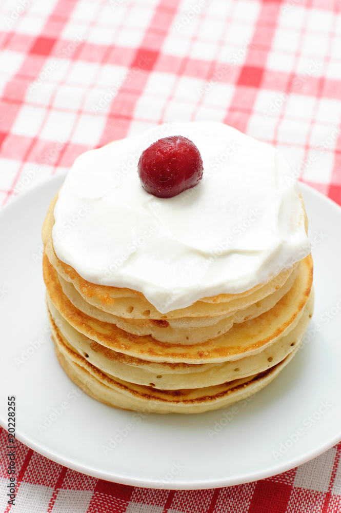 pancakes with cream and cherries pancakes with cream and cherries