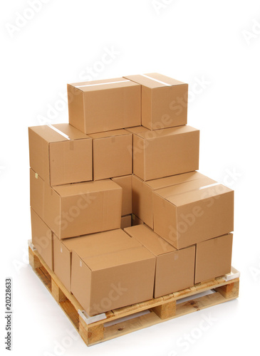 cardboard boxes on wooden palette