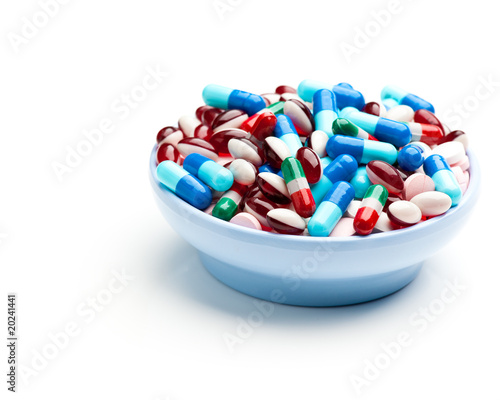 Fotografía Bowl of multicolored pills, tablets, and capsules