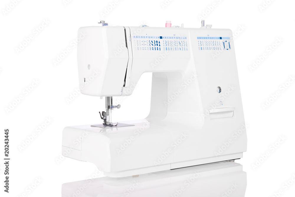 Modern electric sewing machine isolated on white background