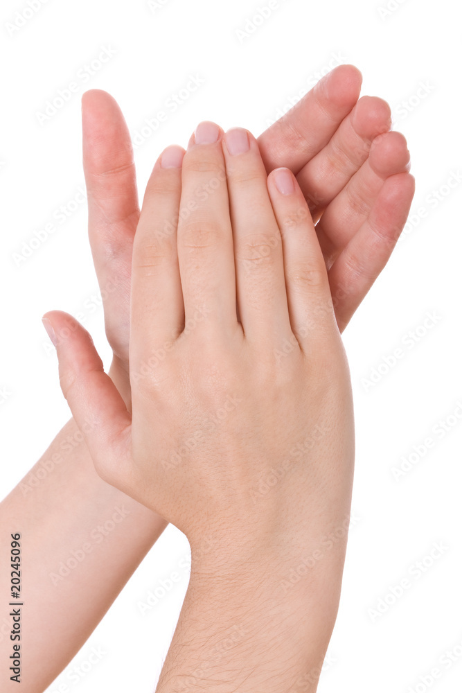 Hands applauding isolated on a white background Hands applauding isolated on a white background