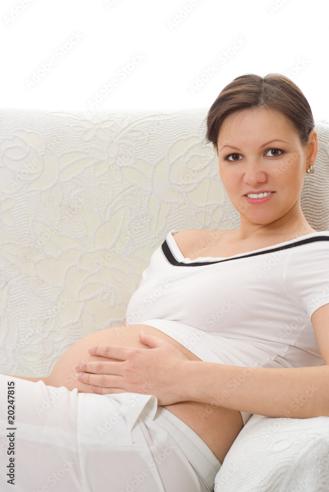 beautiful woman sitting on white chair beautiful woman sitting on white chair
