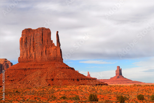 The Mittens in Monument Valley under a stormy sky