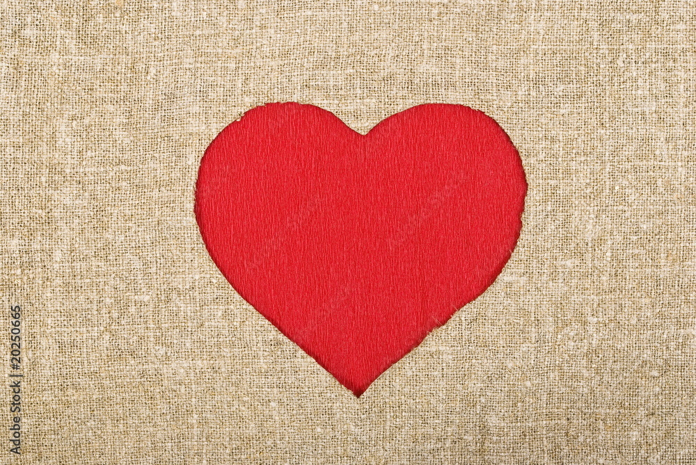 Red heart on sackcloth background Red heart on sackcloth background