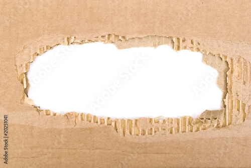 Corrugated cardboard sheet torn