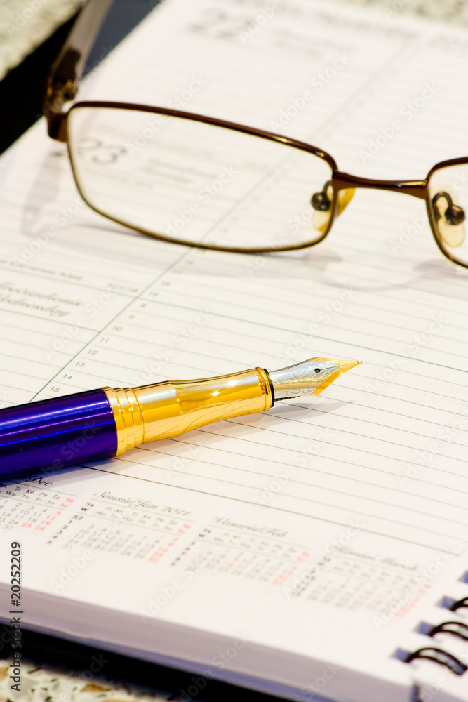 Business Diary With Spectacles And Pen Business Diary With Spectacles And Pen