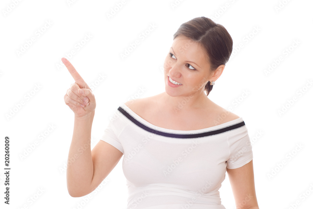 pretty young female pointing at copyspace isolated on white. pretty young female pointing at copyspace isolated on white.