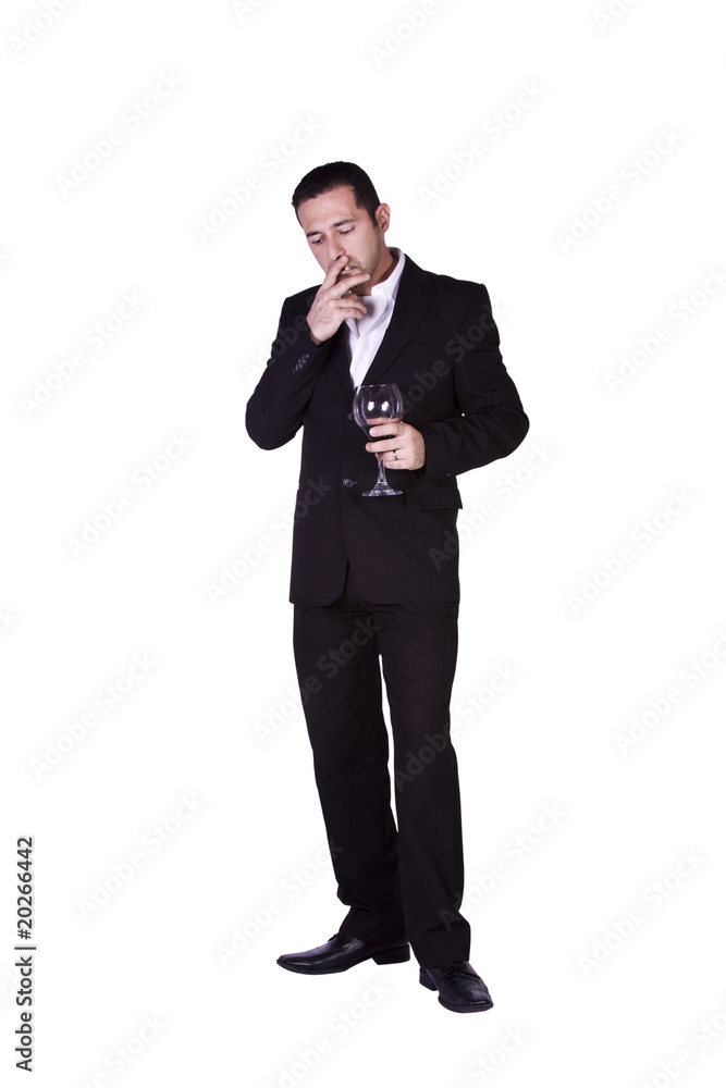 Businessman celebrating with a glass of drink and a smoke Businessman celebrating with a glass of drink and a smoke