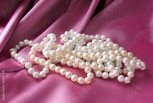 pearls on pink satin