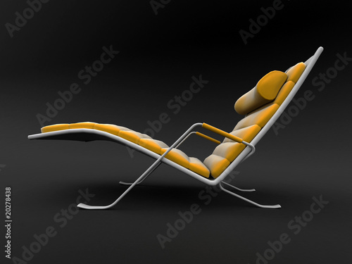 Slika na platnu Isolated chaise lounge against black background