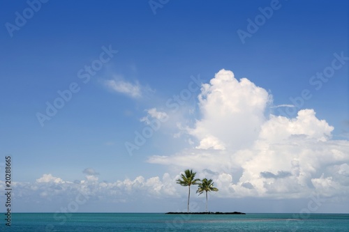 Blue summer day in lonely island lost on sea ocean © lunamarina