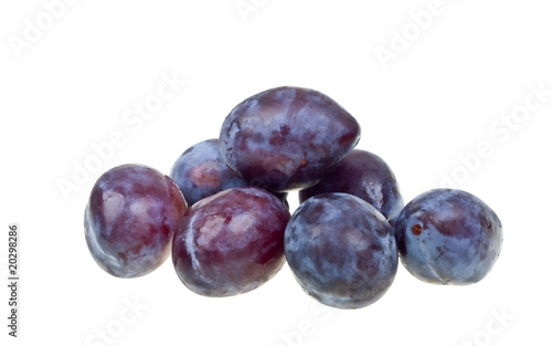 Fresh natural plums isolated on white