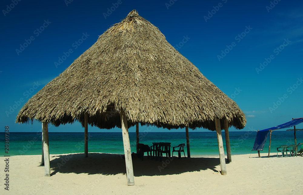 Shadow giving hut at Playa Blanca, Colombia
