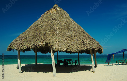 Shadow giving hut at Playa Blanca, Colombia © Ildi