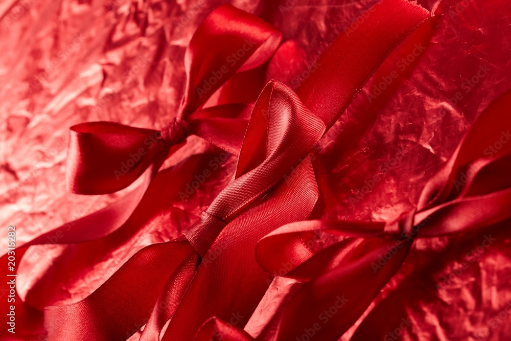 satin ribbons on the red background satin ribbons on the red background
