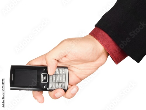Businessman's hand holding a cell phone - isolated on white