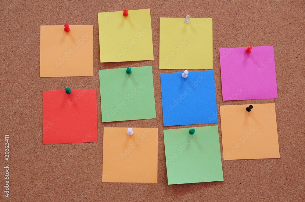 Coloured memory paper - reminder on a noticeboard. Coloured memory paper - reminder on a noticeboard.