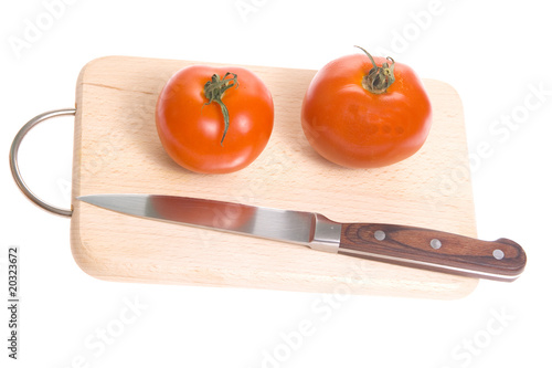 Tomatoes on cutting board