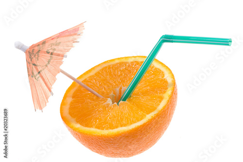 Fototapeta Naklejka Na Ścianę i Meble -  Half of orange with tube and umbrella