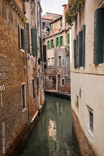Small Side Canal Reflection Venice Italy