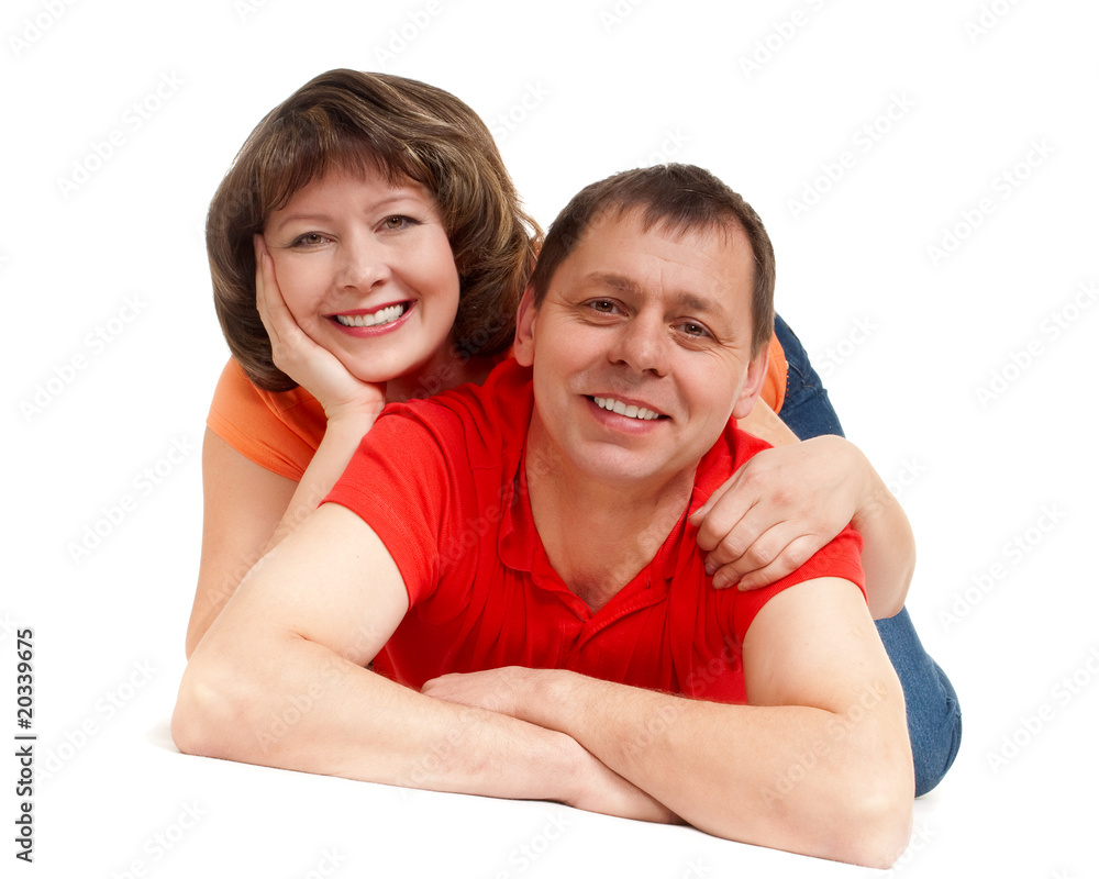 happy couple laying on the floor