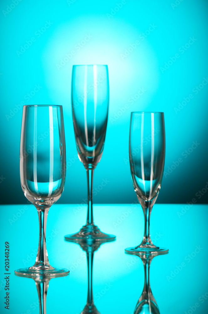 Wine glasses against colourful background Wine glasses against colourful background
