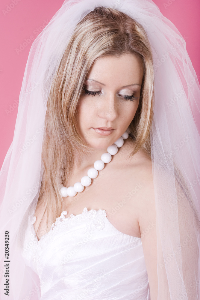 studio portrait of a happy bride with closed eyes studio portrait of a happy bride with closed eyes