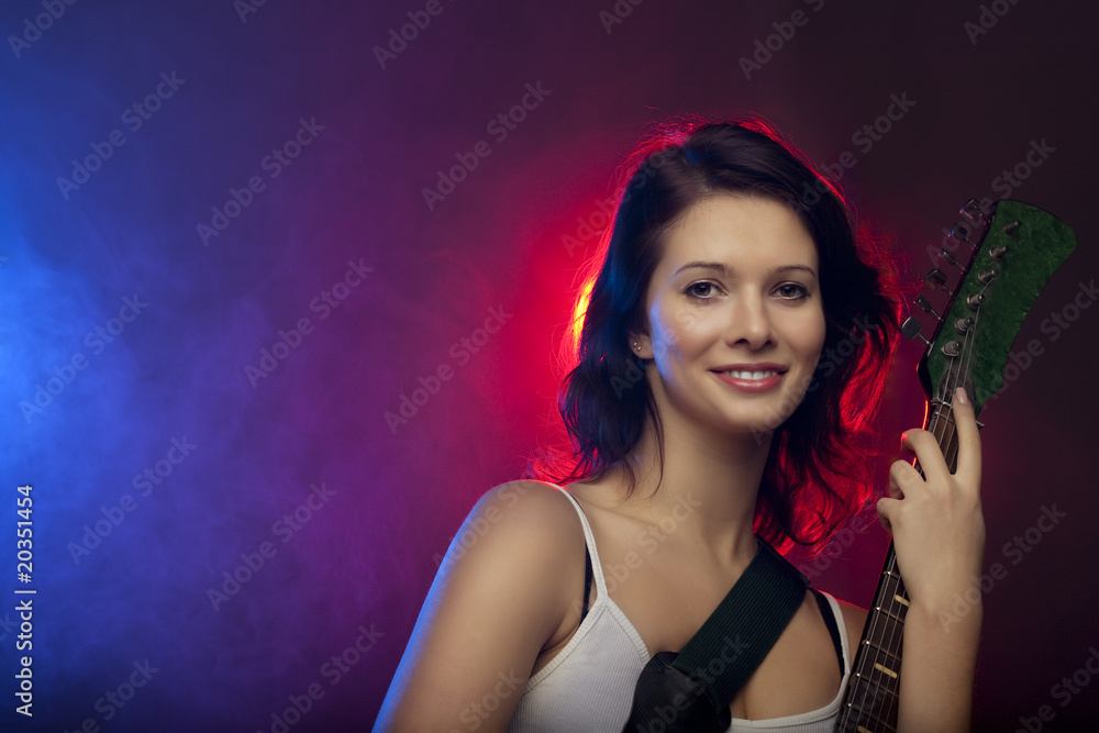 Naklejka premium Beautiful girl with a guitar