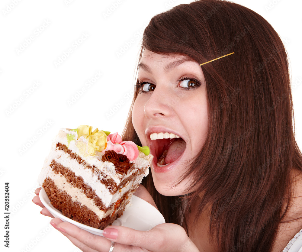Girl eating piece of cake. Isolated. Girl eating piece of cake. Isolated.