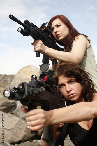 Sexy women with assault guns © Peter Kim
