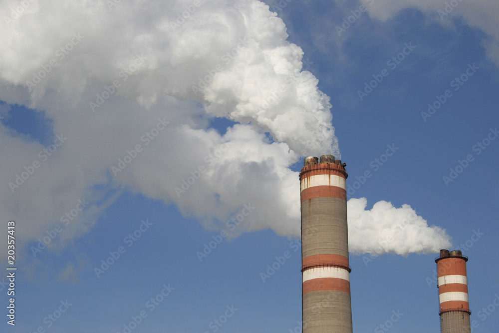 Pipes of electric power station and smoke from it Pipes of electric power station and smoke from it