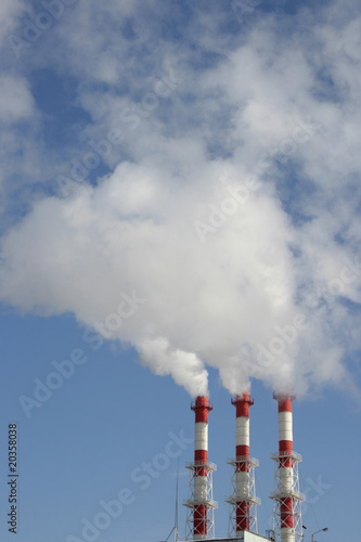 Pipes of electric power station and smoke from it