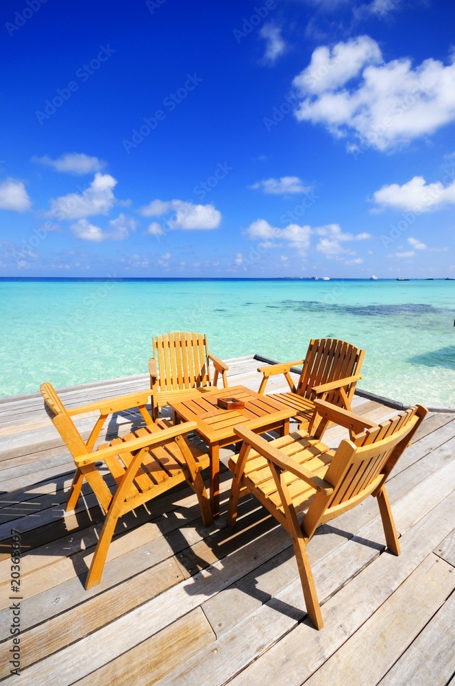 chair and table at beach of maldives