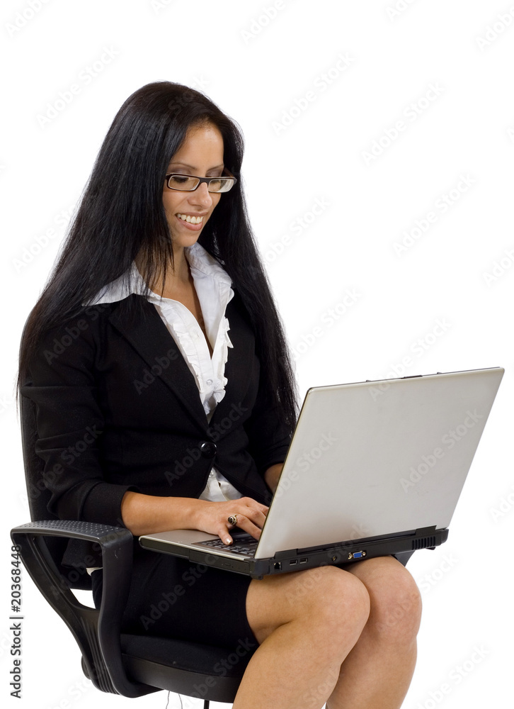businesswoman in chair with laptop computer businesswoman in chair with laptop computer