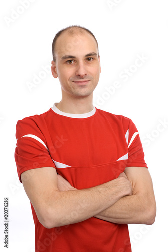 handsome man in a red t-shirt. isolated over white