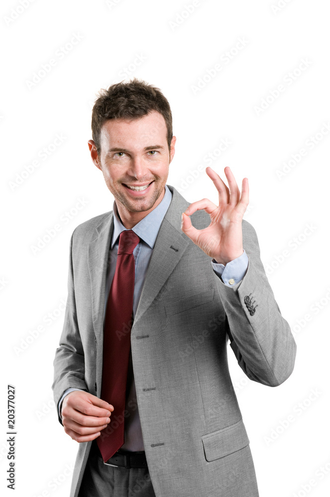Satisfied business man showing okay sign Satisfied business man showing okay sign