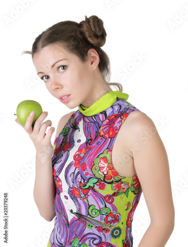 The girl with an apple  isolated on white background