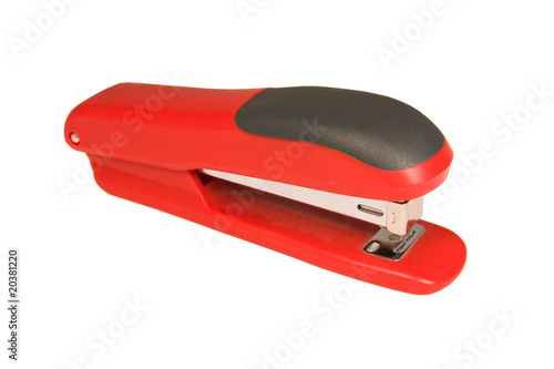 Red stapler isolated on a white background