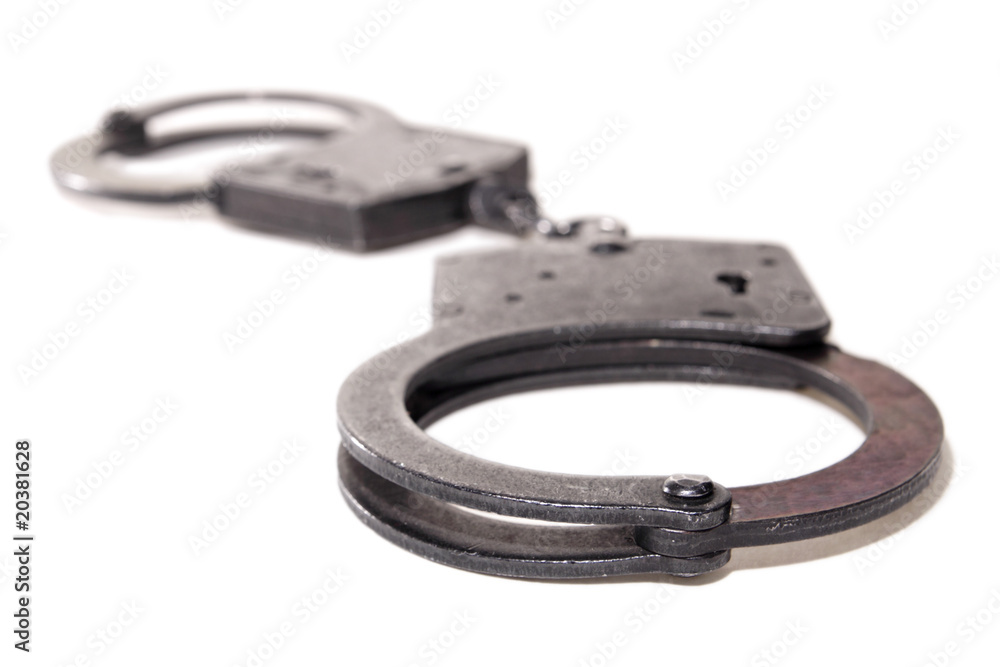 Black handcuffs isolated on white background Black handcuffs isolated on white background