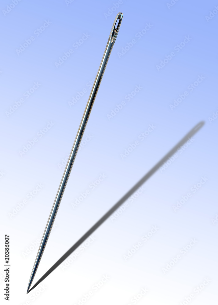Steel needle on a blue background Steel needle on a blue background