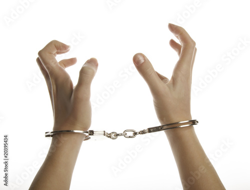 Hands and handcuffs