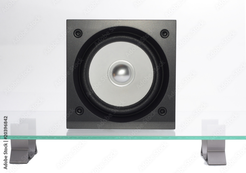 Fototapeta premium broadband speaker on the glass table.