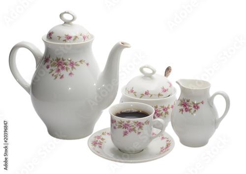 coffee-pot with one cup isolated on white.