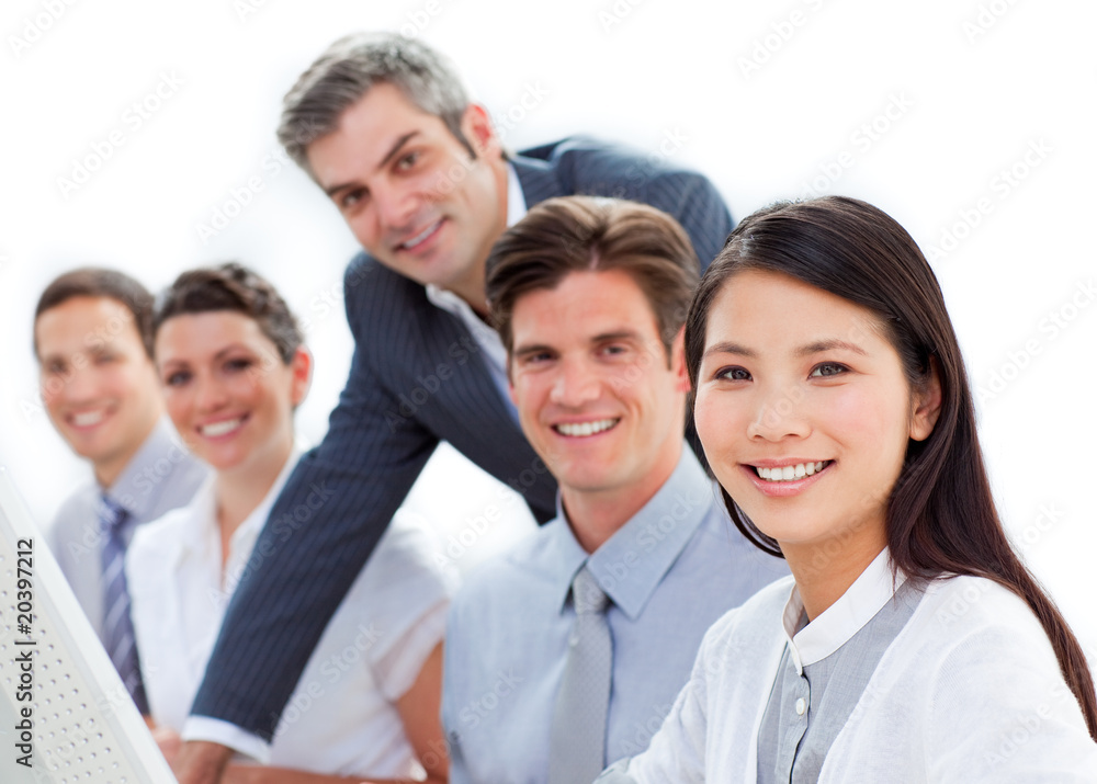 Charismatic manager checking his employee's work Charismatic manager checking his employee's work