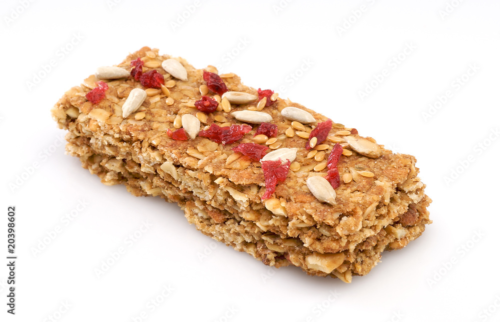 Granola bar with cranberries and nuts isolated on a white Granola bar with cranberries and nuts isolated on a white