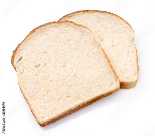 Two slices of white sandwich bread isolated with clipping path