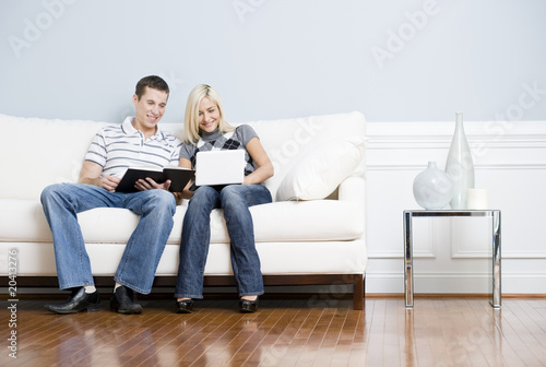 Happy Couple Relaxing on Couch