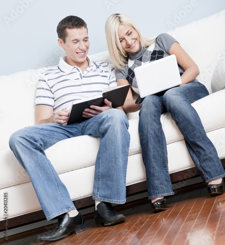 Happy Couple Relaxing on Couch