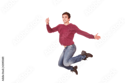 Excited young man jumping